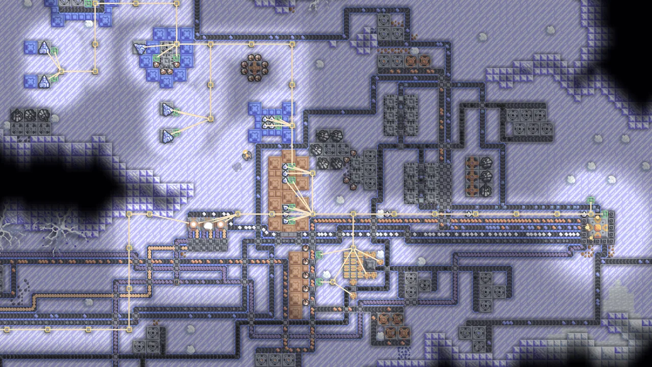 Machines and conveyors on icy ground (Mindustry, via Steam)