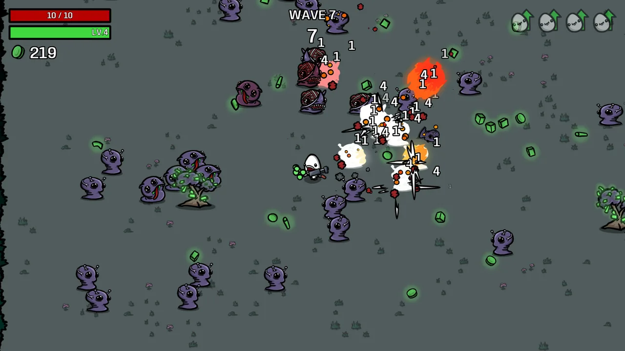 敵と緑の材料が散らばる画面(Brotato・Steamストアより)