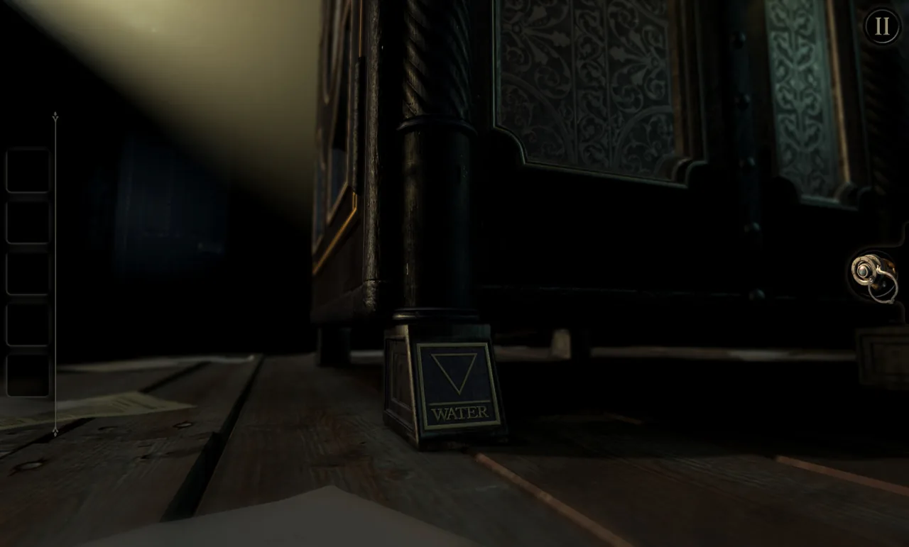 A WATER plaque at the base of the box (The Room, via Steam)