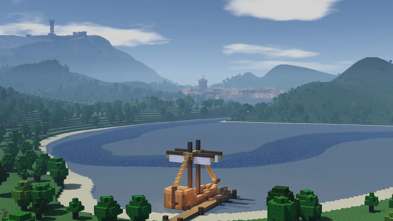 A wooden boat by the water and distant mountains (Colony Survival, via Steam)