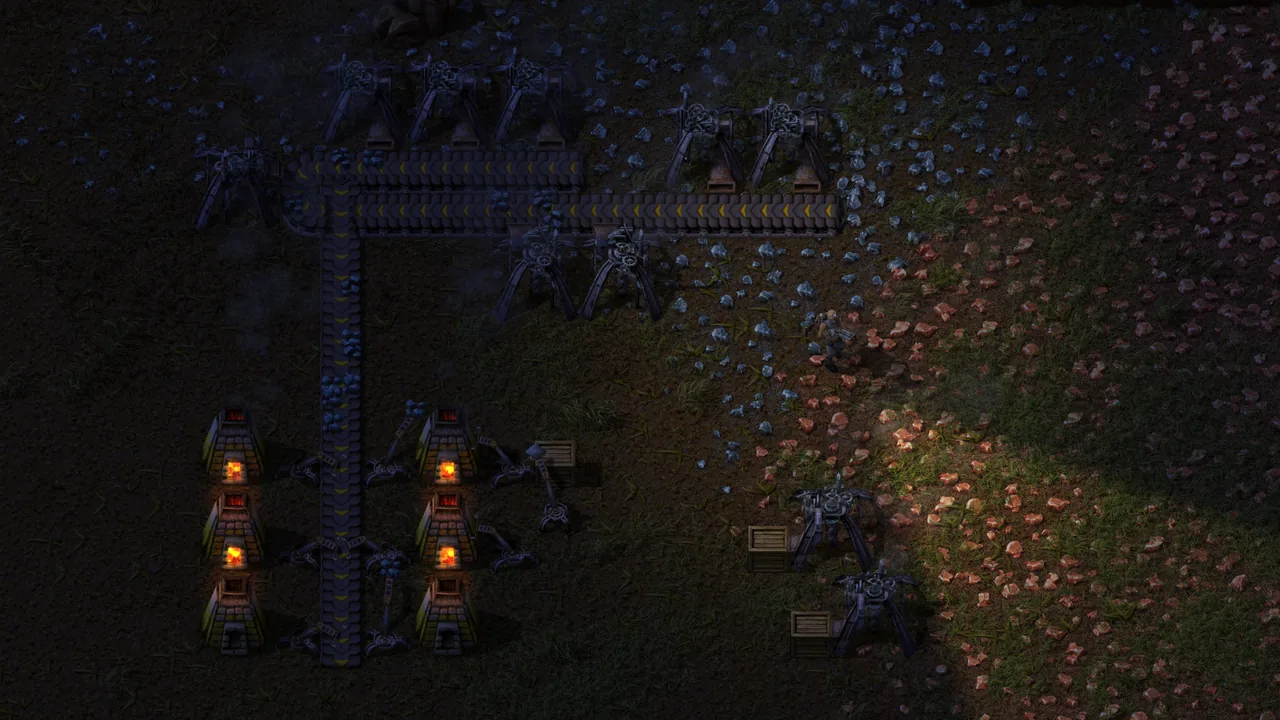 Mining drills and belts at night (Factorio, via Steam)