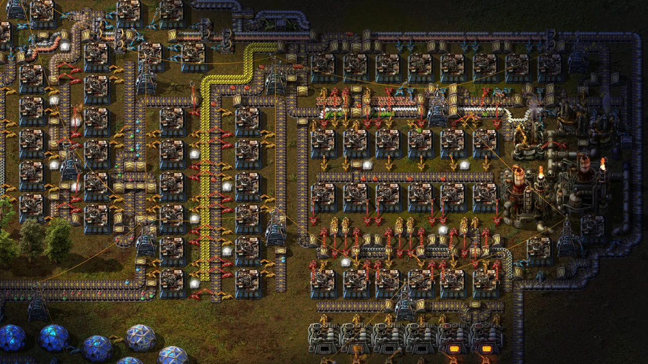 Dense rows of assembling machines and belts (Factorio, via Steam)