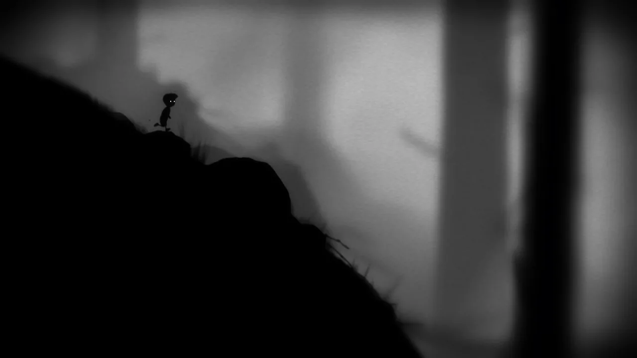 The boy moving along the top of a steep slope (LIMBO, via Steam)