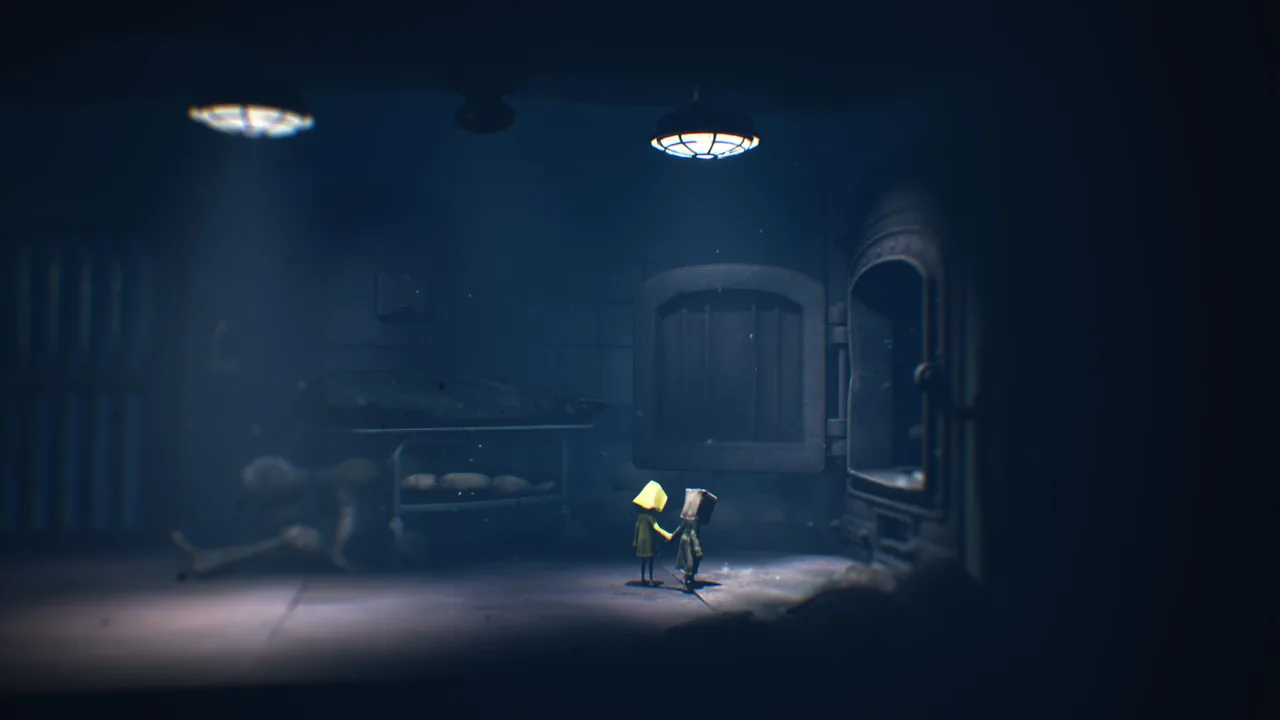 Mono and Six standing in a dark room (Little Nightmares II, via Steam)
